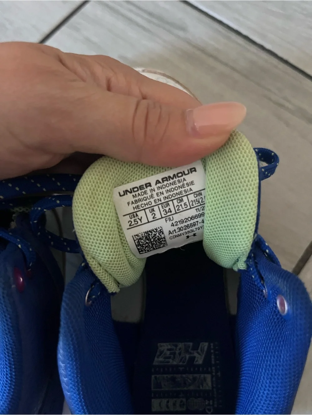 Under Armour Kids White and Blue Cleats with Neon Accents